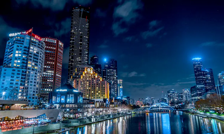 Southbank apartment towers and the Yarra River at night